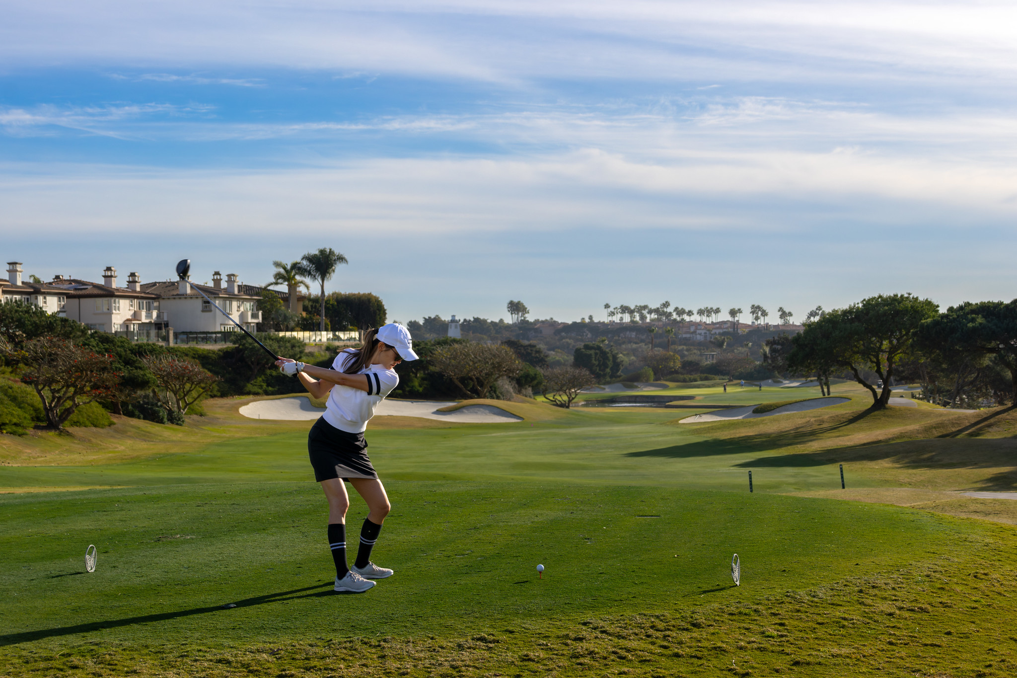 Attendees golfing at Winter Real Estate Private Funds