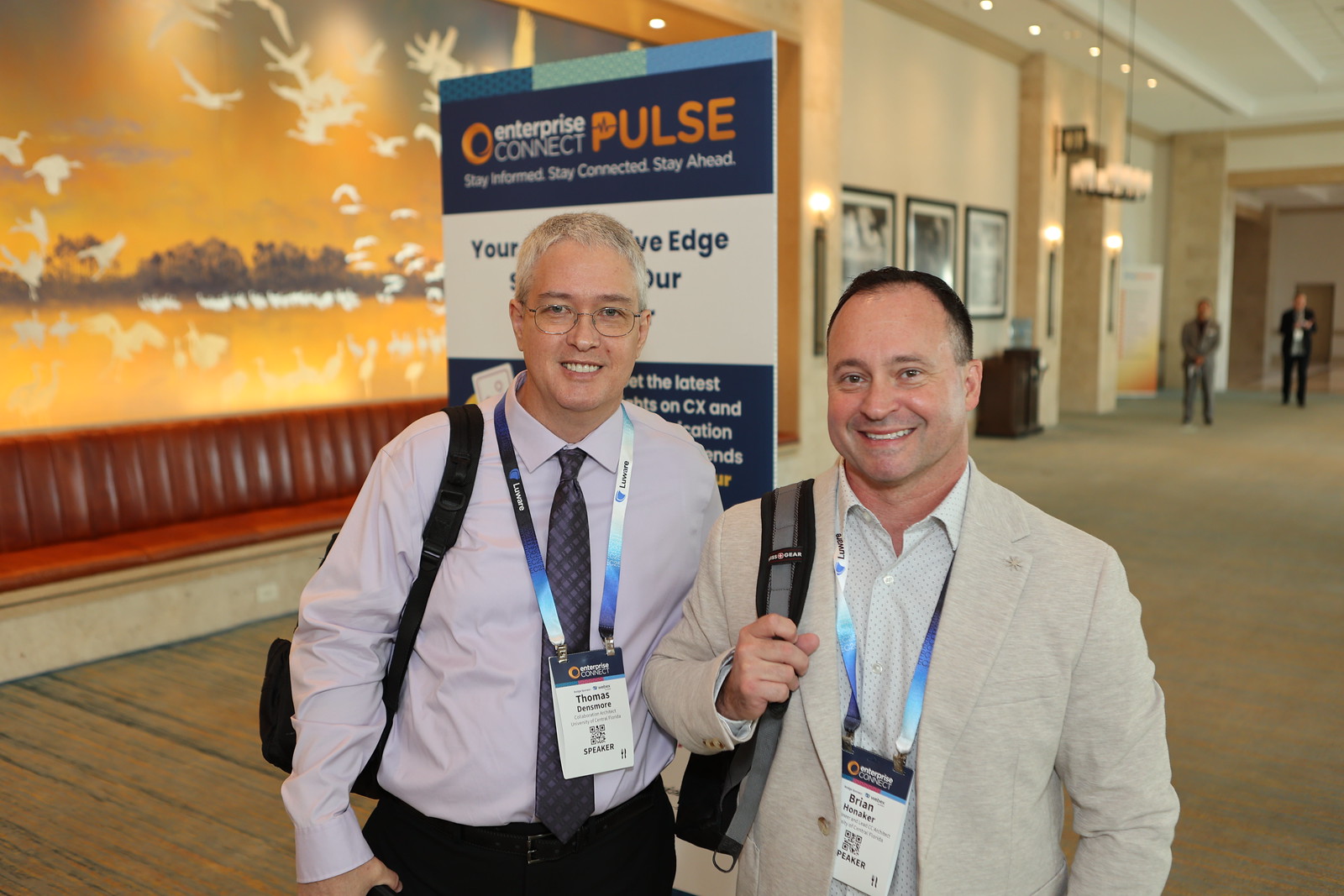 Enterprise Communications Conference attendee in a session