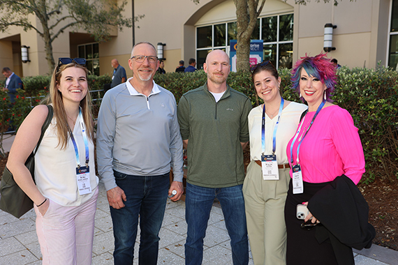 Enterprise Communications Conference attendee in a session