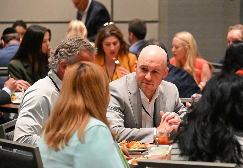 Attendees networking at The Distressed Forum for Bank Special Assets Dallas