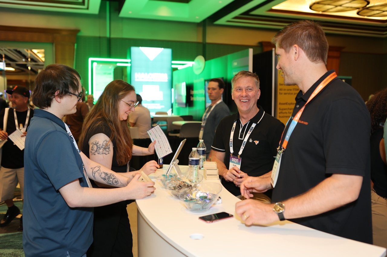 Attendees at Exhibitor Booth