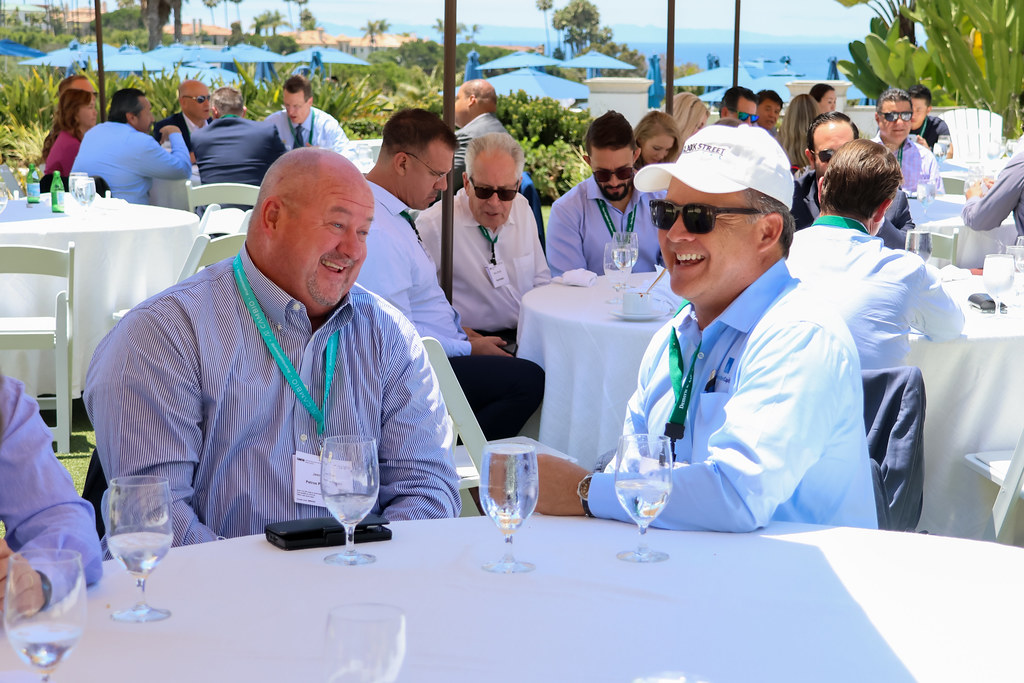 Attendees connecting at the bank special assets Dallas