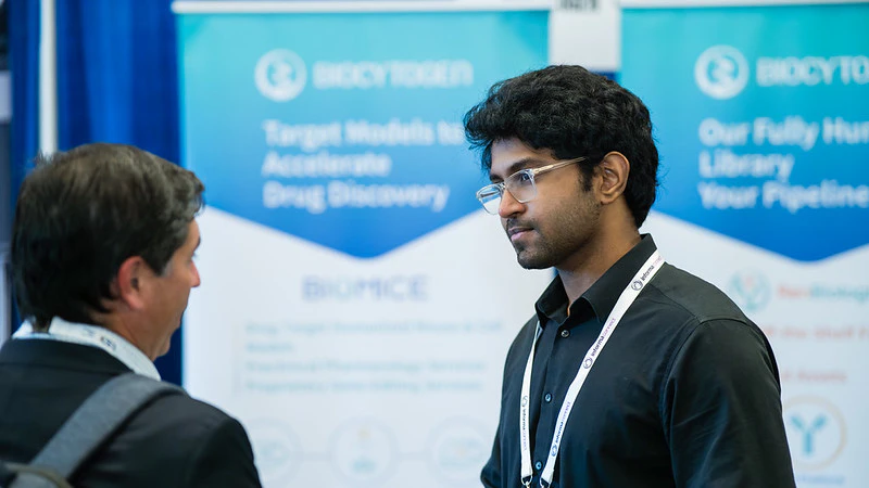 Exhibitor explaining their product at the LSX World USA