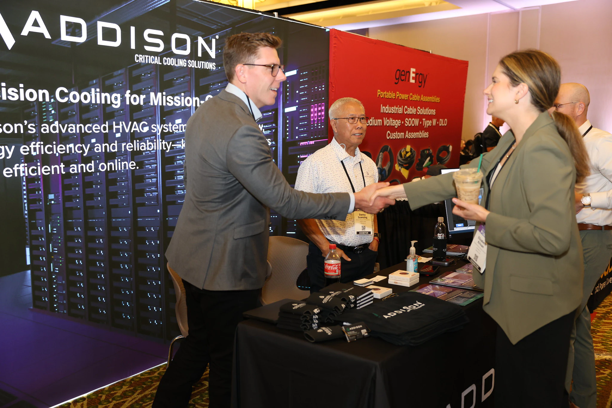 Attendees walking through expo hall with overlay text Leading Solution Providers