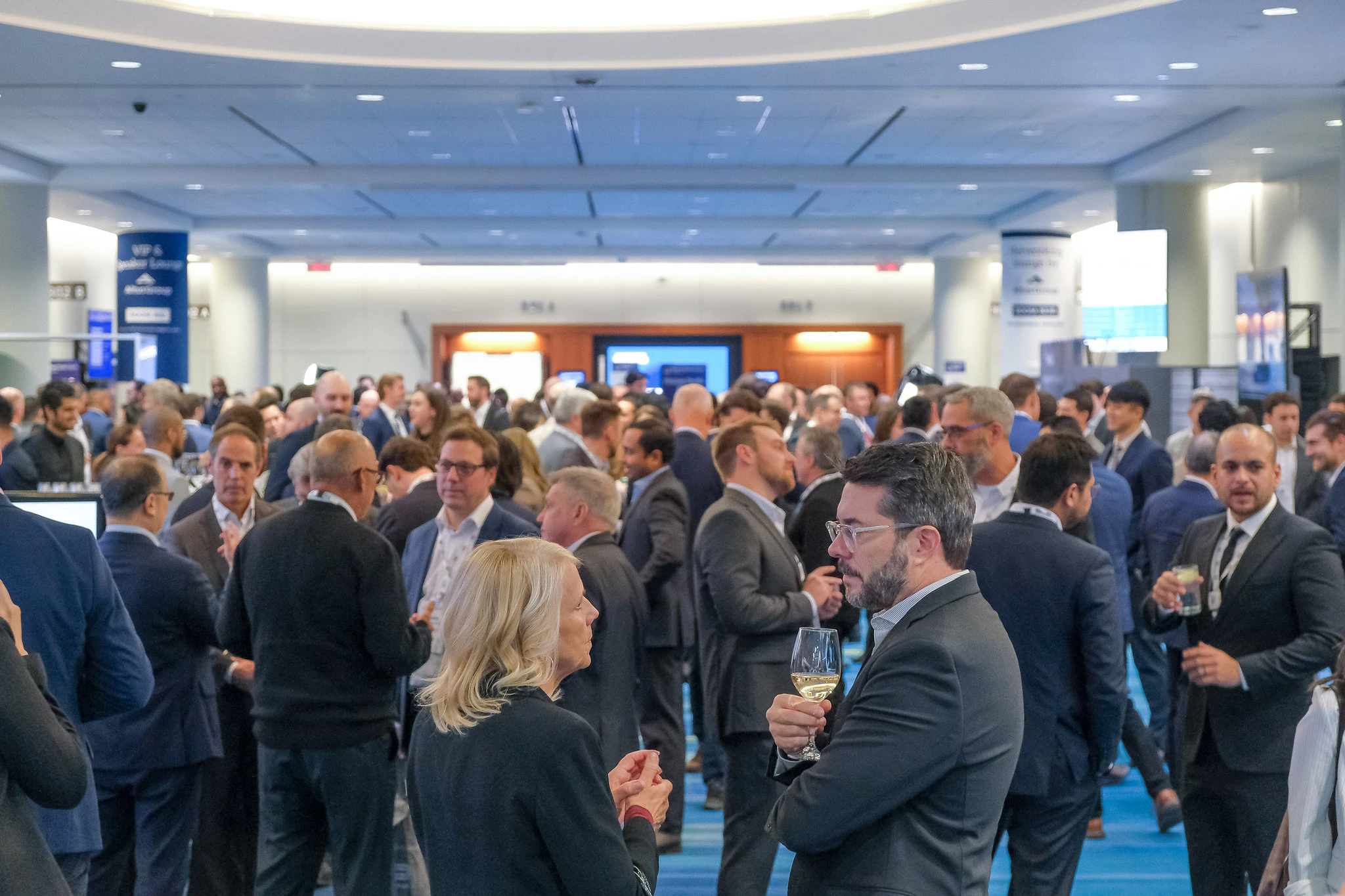 Attendees networking at Canadian Real Estate Asset Management Forum