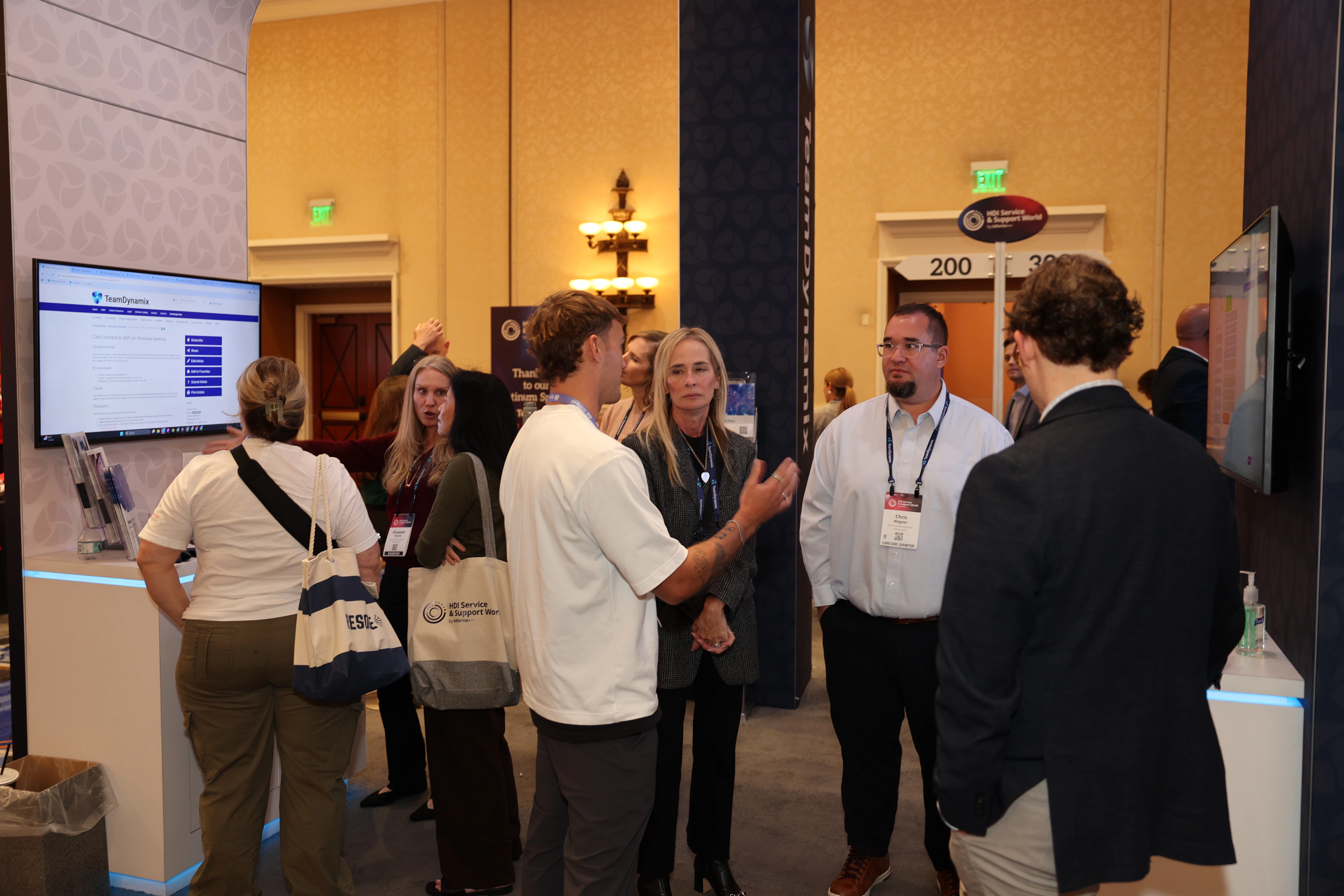 Attendees at Exhibitor Booth