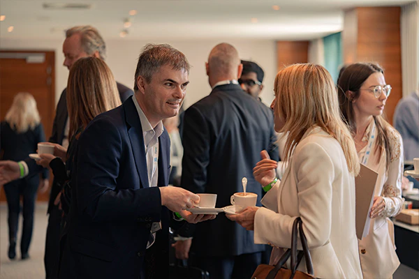 Industry leaders networking at the drinks reception during World Ethanol & Biofuels 2025 in Brussels, part of sponsorship hospitality packages.