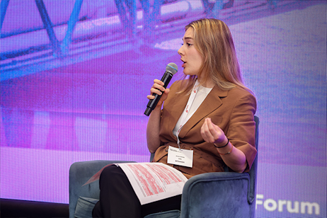 Woman with microphone on stage