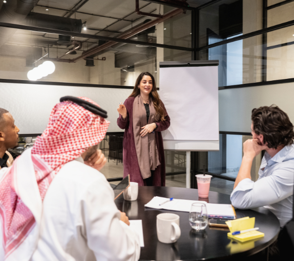 Industry professionals participating in an Exclusive Workshop at Saudi Intermobility Expo 2025, led by a speaker presenting project management and engineering insights.