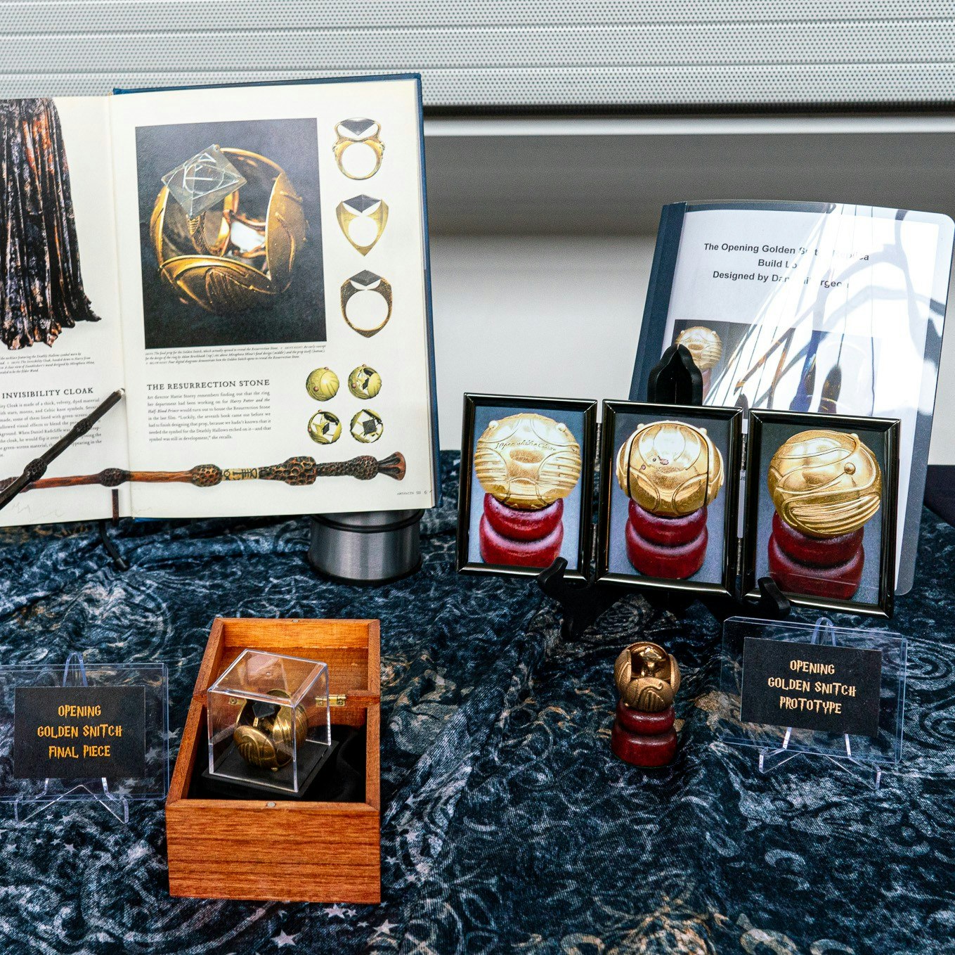 A exhibit of the Golden Snitch Replica with examples and a prototype.