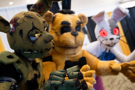 Springtrap, Freddy, and Vanny from FNAF pose menacingly