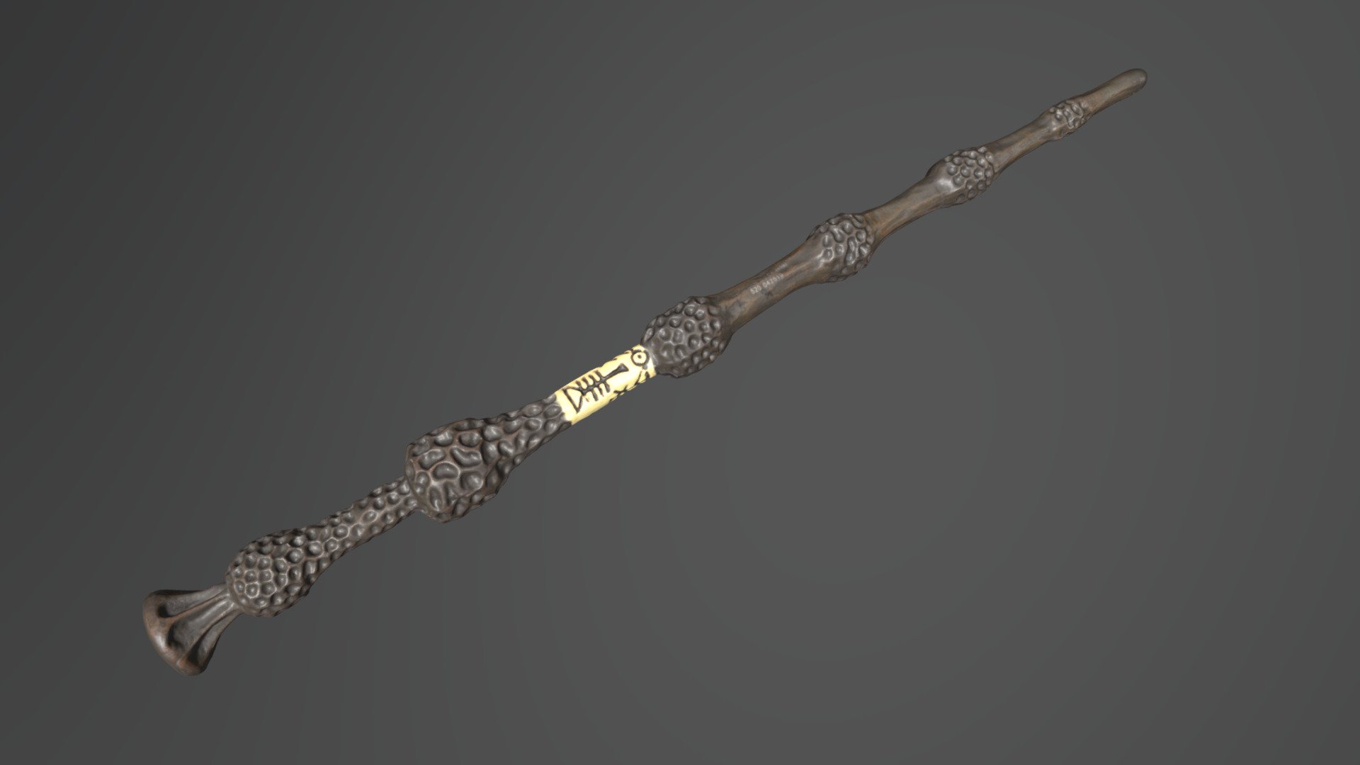 The elder wand suspended on a gray background