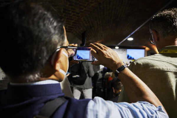 The AI Summit London man filming stage
