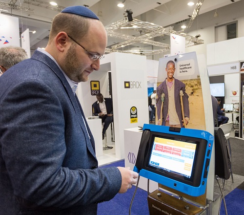 Delegate trying out tech in the Technology Arena