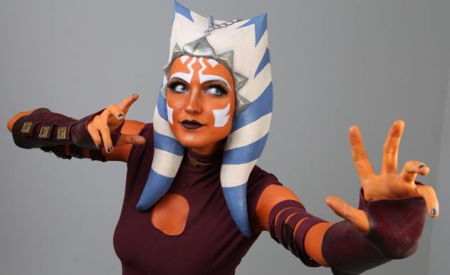 A cosplayer wearing an Ahsoka Tano headpiece made by Wretched Hive Creations