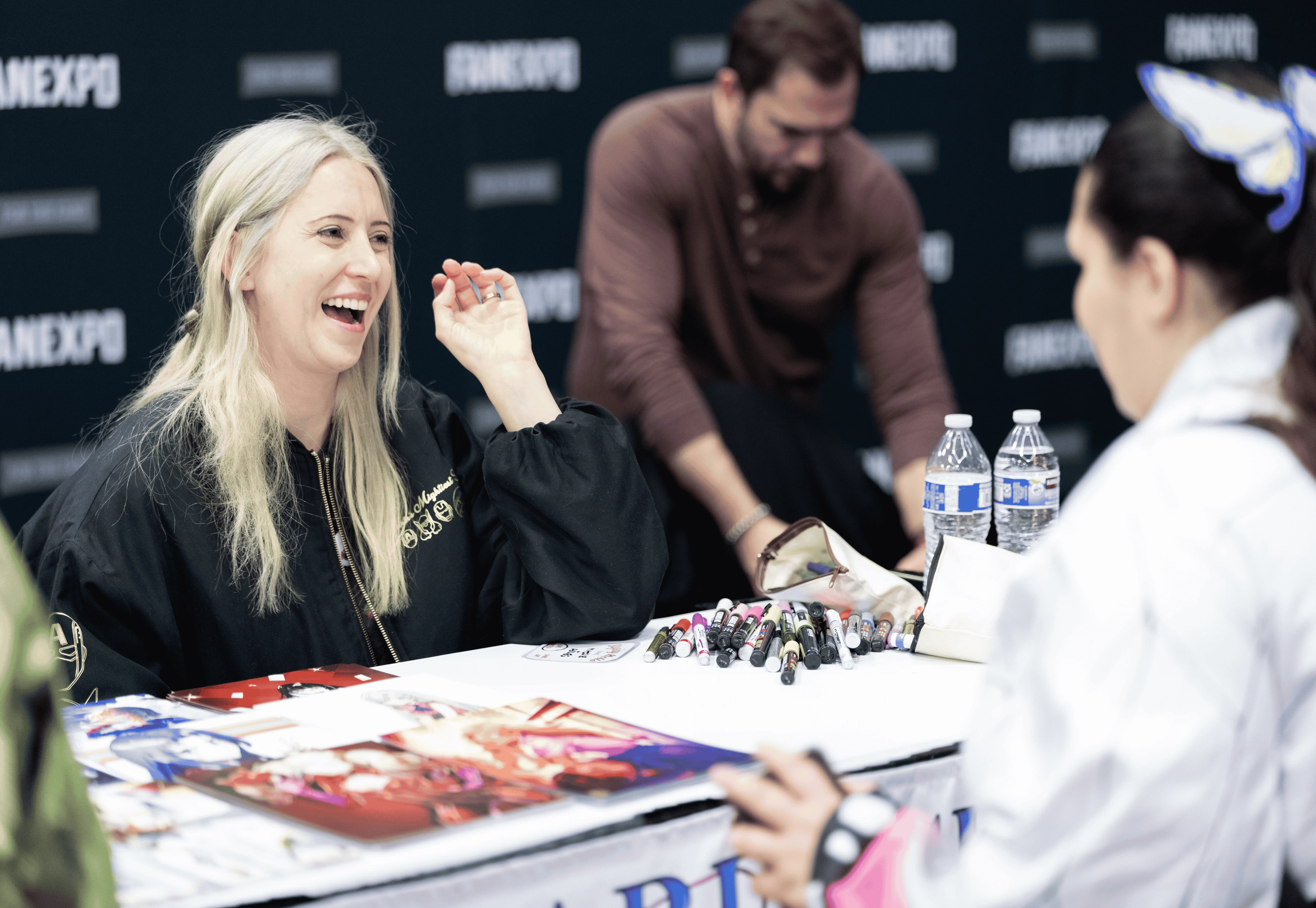 Christopher Sabat posting with Dragon Ball Z animation and Funko POP!