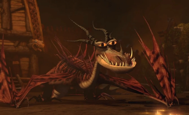 An orange, angular dragon smiles, surrounded by viking ships. All bathed in fire light.