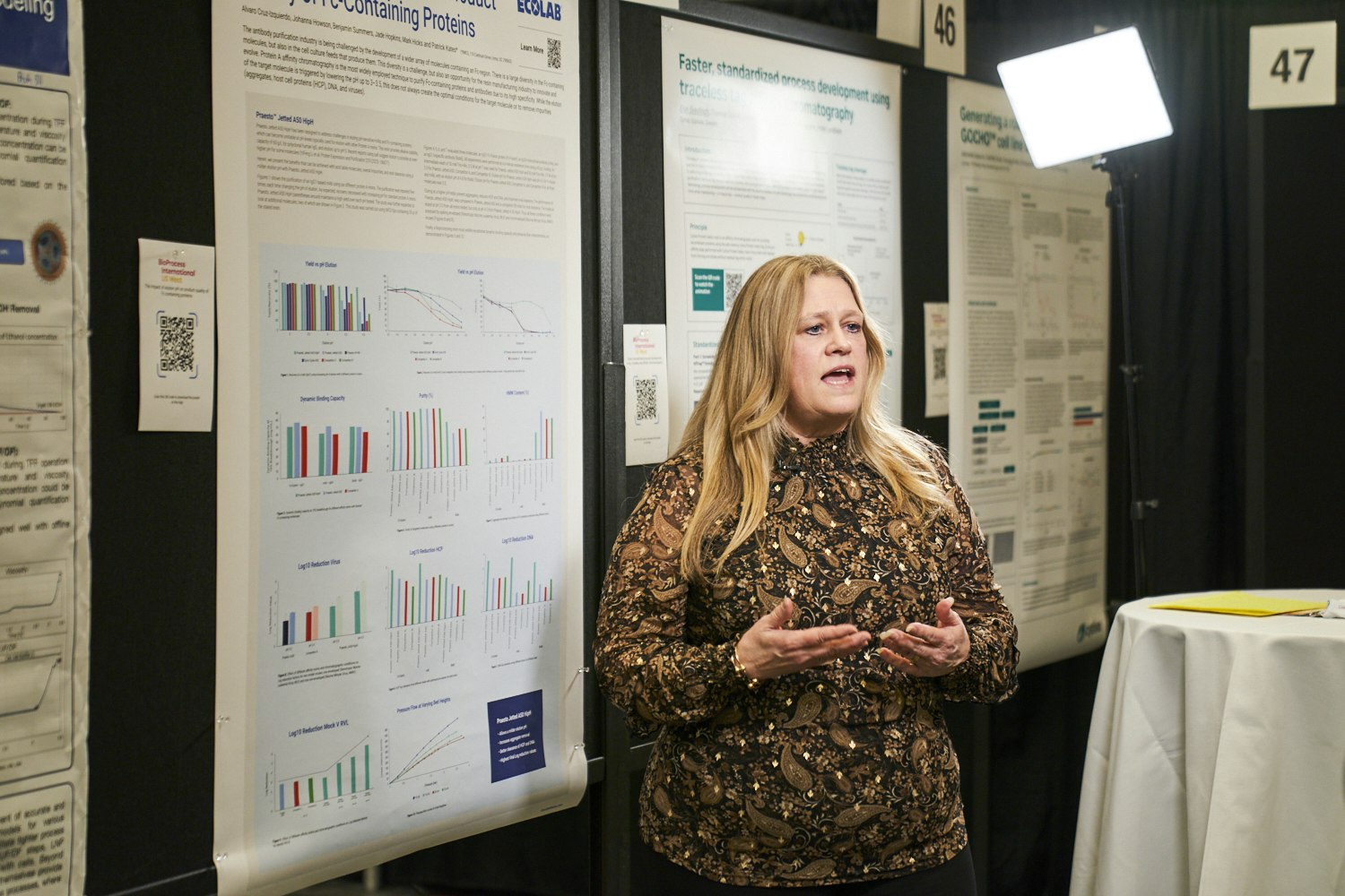 An attendee presents their post at BioProcess International US West