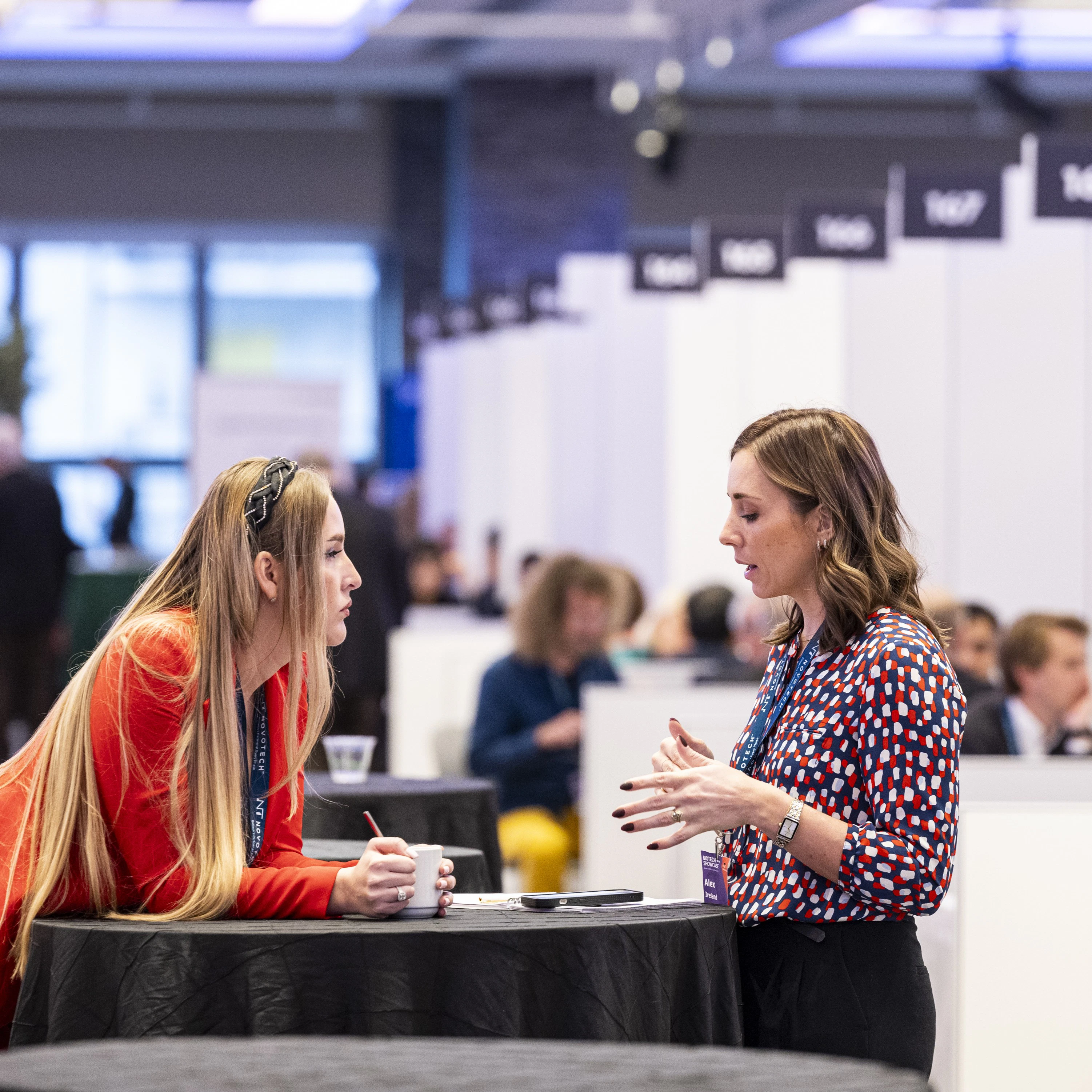 Two life science executives networking at Biotech Showcase
