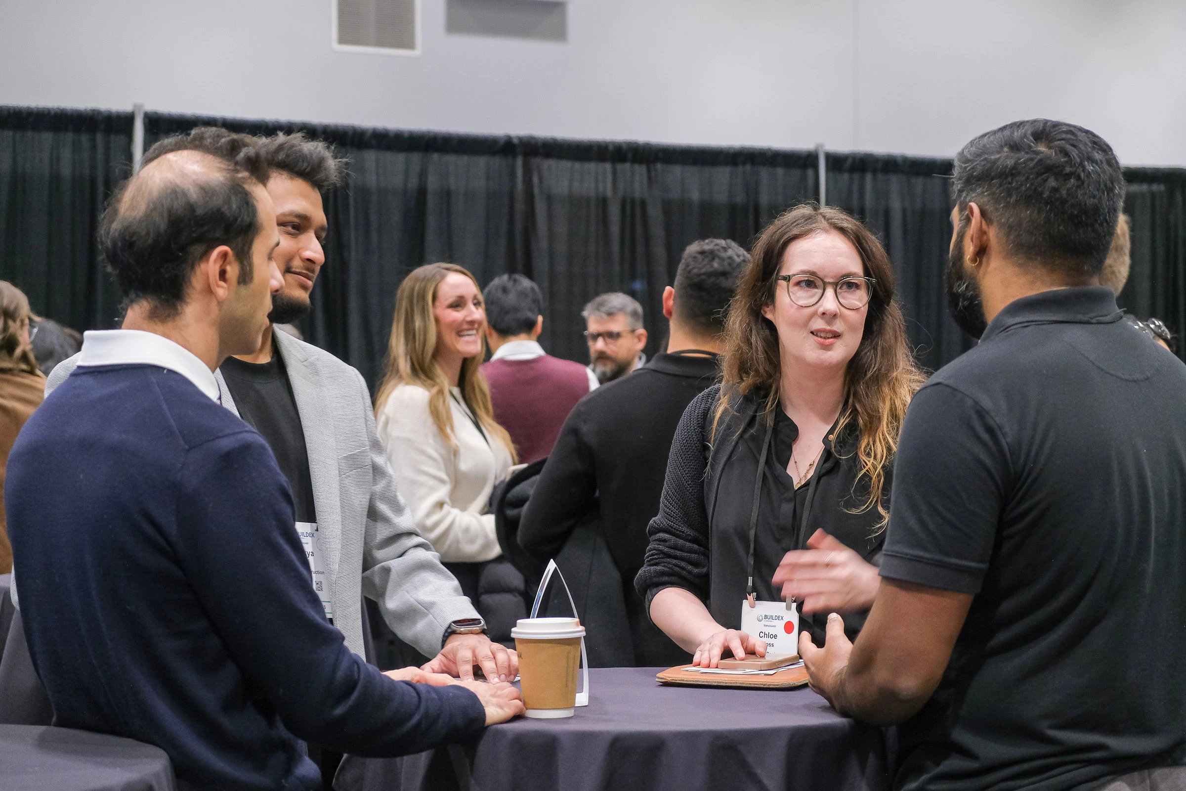 Close up photo of attendees chatting during a networking sessoin