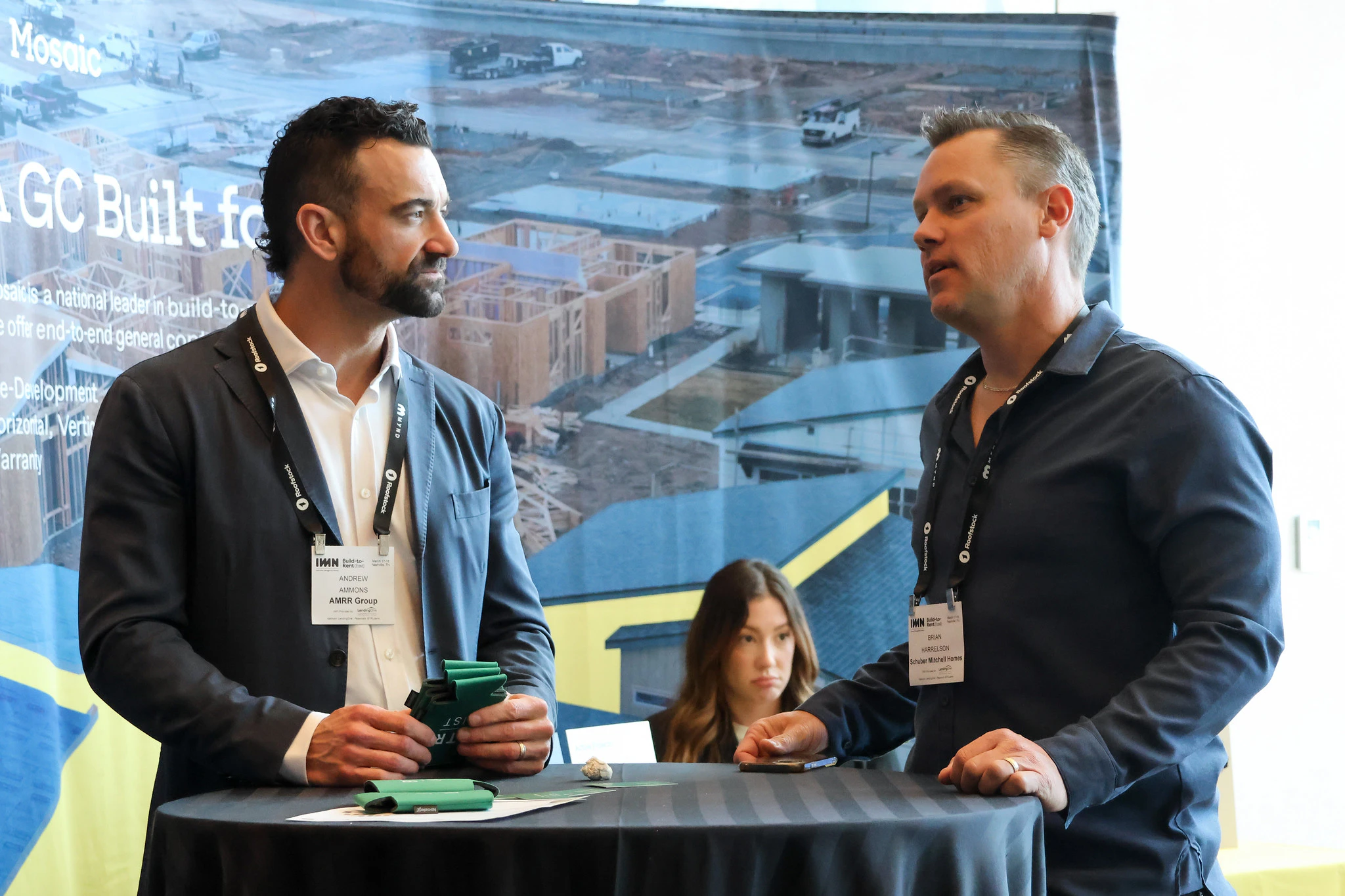 Attendees with lanyards at Carolinas Middle-Market Multifamily