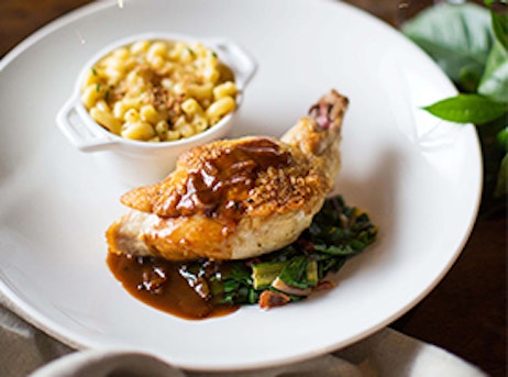 fried chicken, mac and cheese and collared greens plate