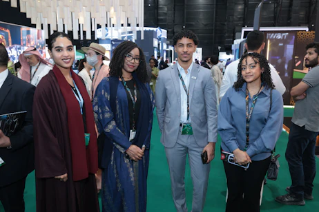 Speaker presenting at Inspire stage at SES 2025, focused on innovation and trends