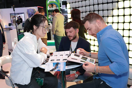 Female speaker presenting on event innovation and trends at SES 2025 in Riyadh