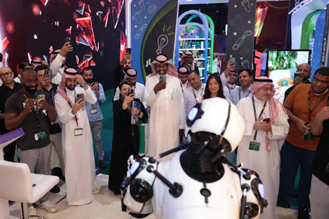 Attendees interacting at the registration counter of Saudi Event Show (SES) 2025 in Riyadh