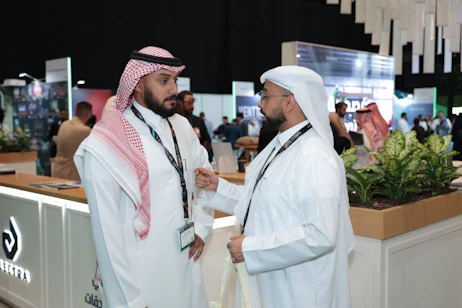 Audience attending a live expert panel at SES 2025, part of the seminar hub in Saudi Arabia
