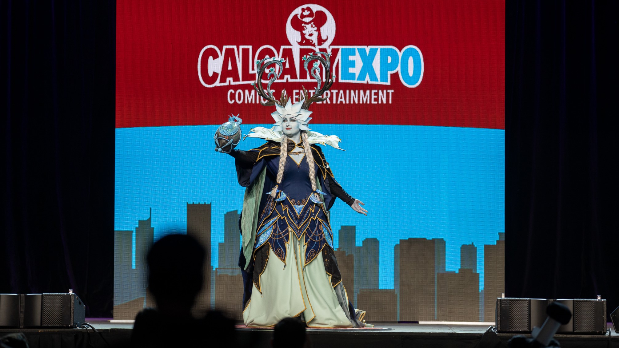 A cosplayer cosplays the Winter Queen from World of Warcraft