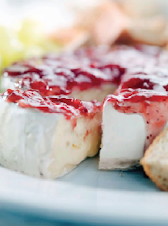 white cheesecake with strawberry glaze