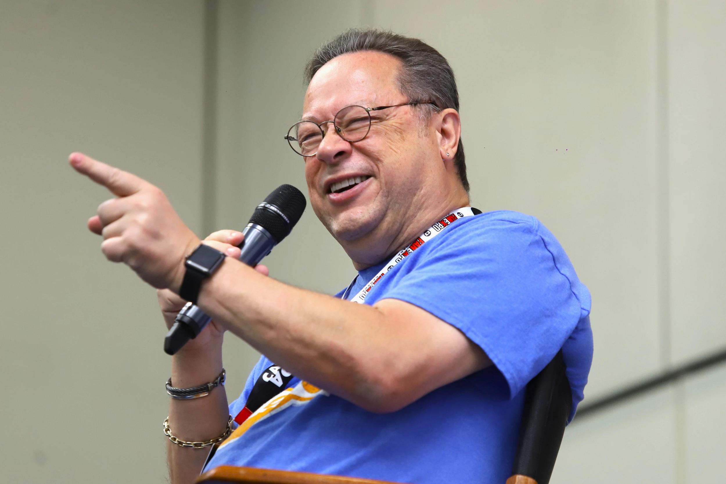 Comic book artist Joe Quesada speaking during a comics panel at FAN EXPO Dallas.