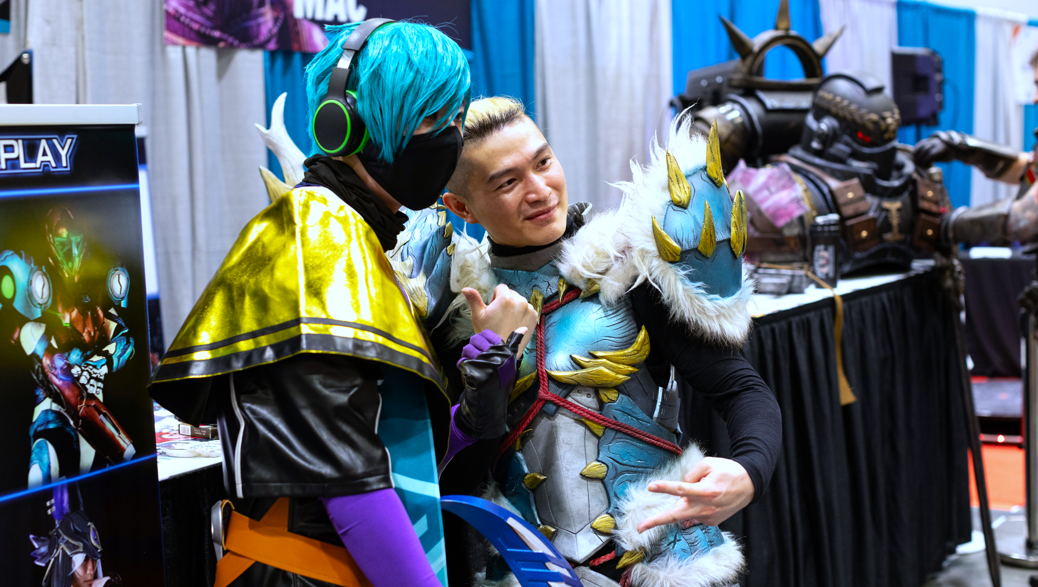 Two cosplayers posing for a photograph.