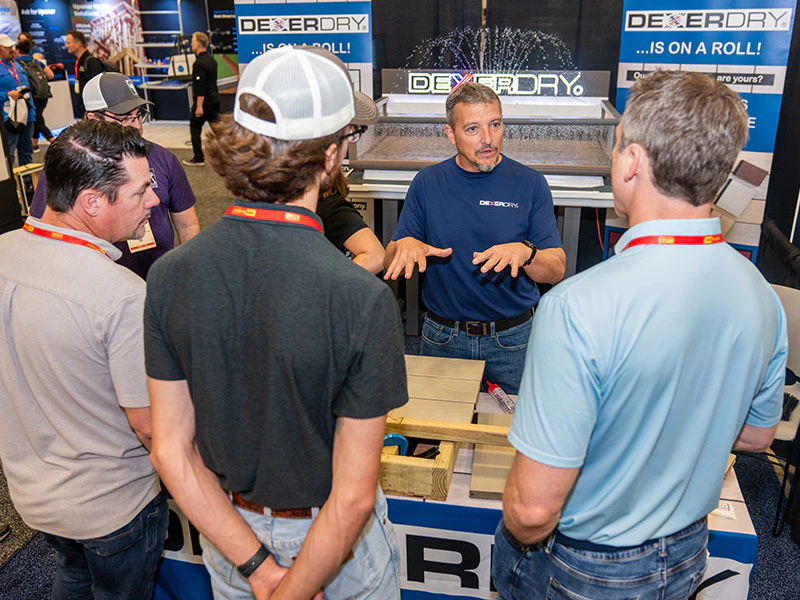 Exhibitor Talking to Attendees