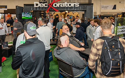 Attendees in Exhibitor Booth