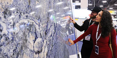Attendee looking at stone