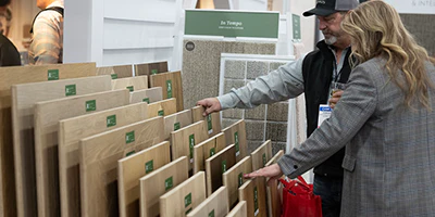Attendees looking at flooring