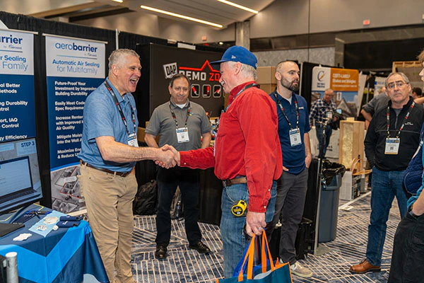 Handshake at a Booth