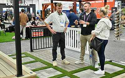 Attendees Looking at Deck Products