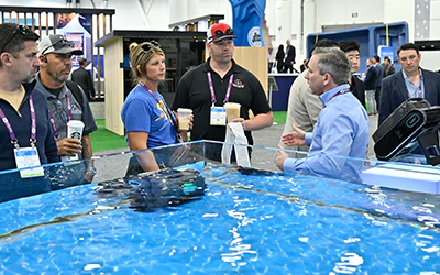 Attendees Looking at Pool Products