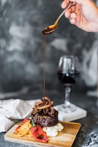 steak with mashed potatoes and sauce