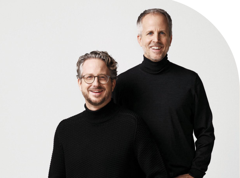 Daniel Sennheiser and Andreas Sennheiser,Daniel Sennheiser and Andreas Sennheiser, Co-CEOs of Sennheiser, posing together in black hoodies against a white background.