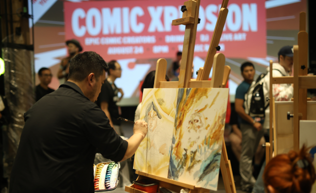 Fans interacting with comic guest Jeph Loeb at FAN EXPO Boston