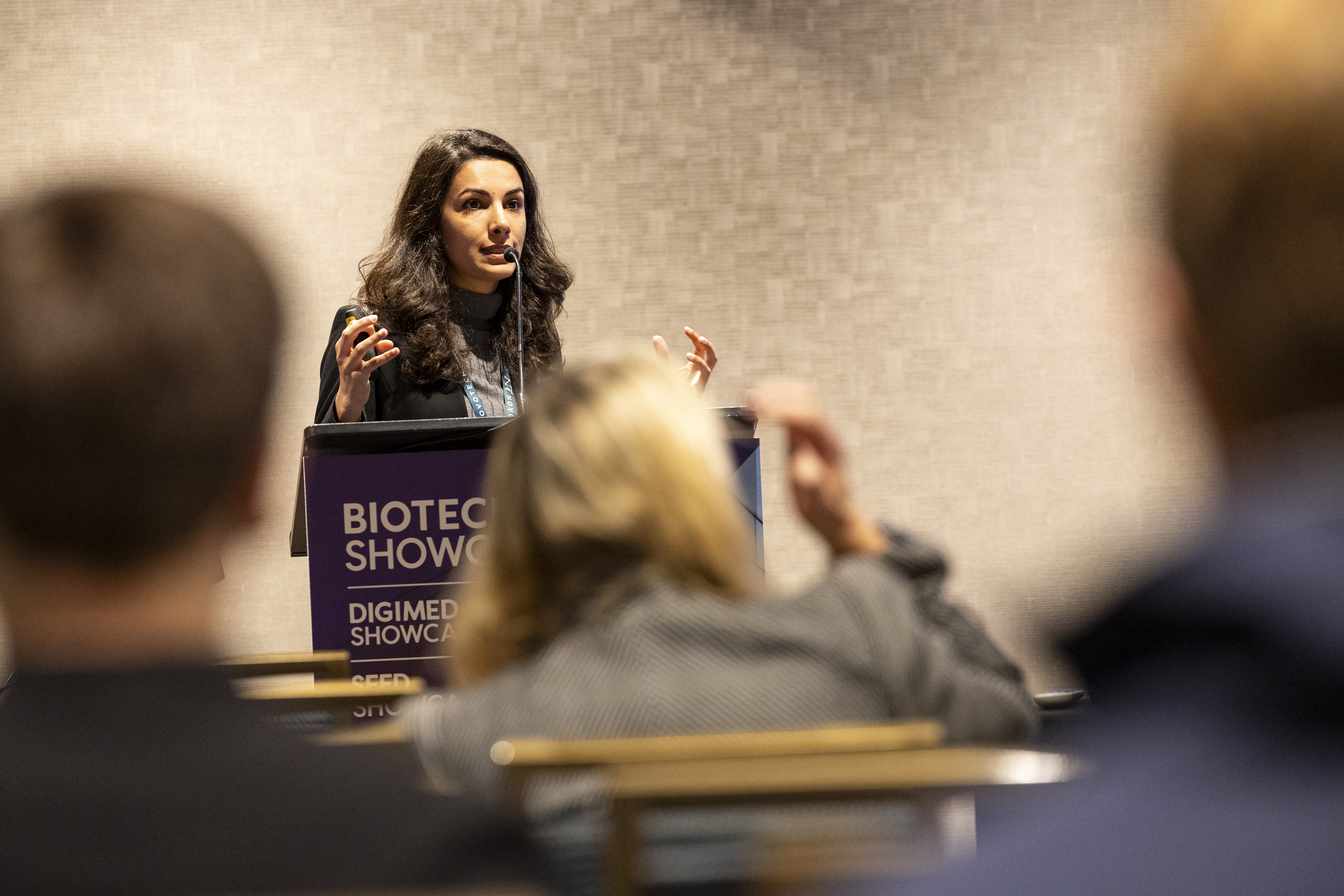 Biotech woman presenting her company at Biotech Showcase