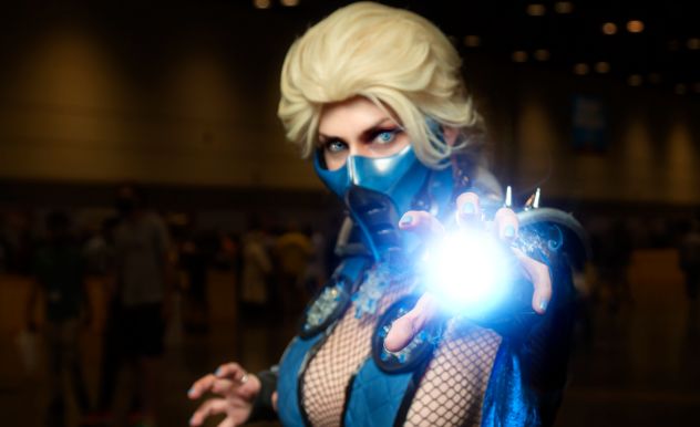 Amazon Steph in a Street Fighter outfit with a digital blast Photoshopped ontop of her hand