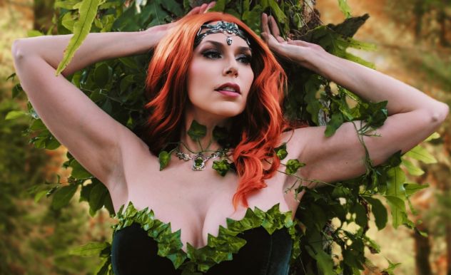 Amazon Steph dressed in cosplay as Poison Ivy with her hands above her head