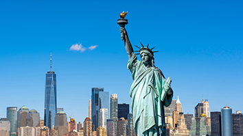 The Statue of Liberty over the Scene of New york cityscape
