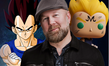 Christopher Sabat smiling in front of his character Vegeta from Dragon Ball Z