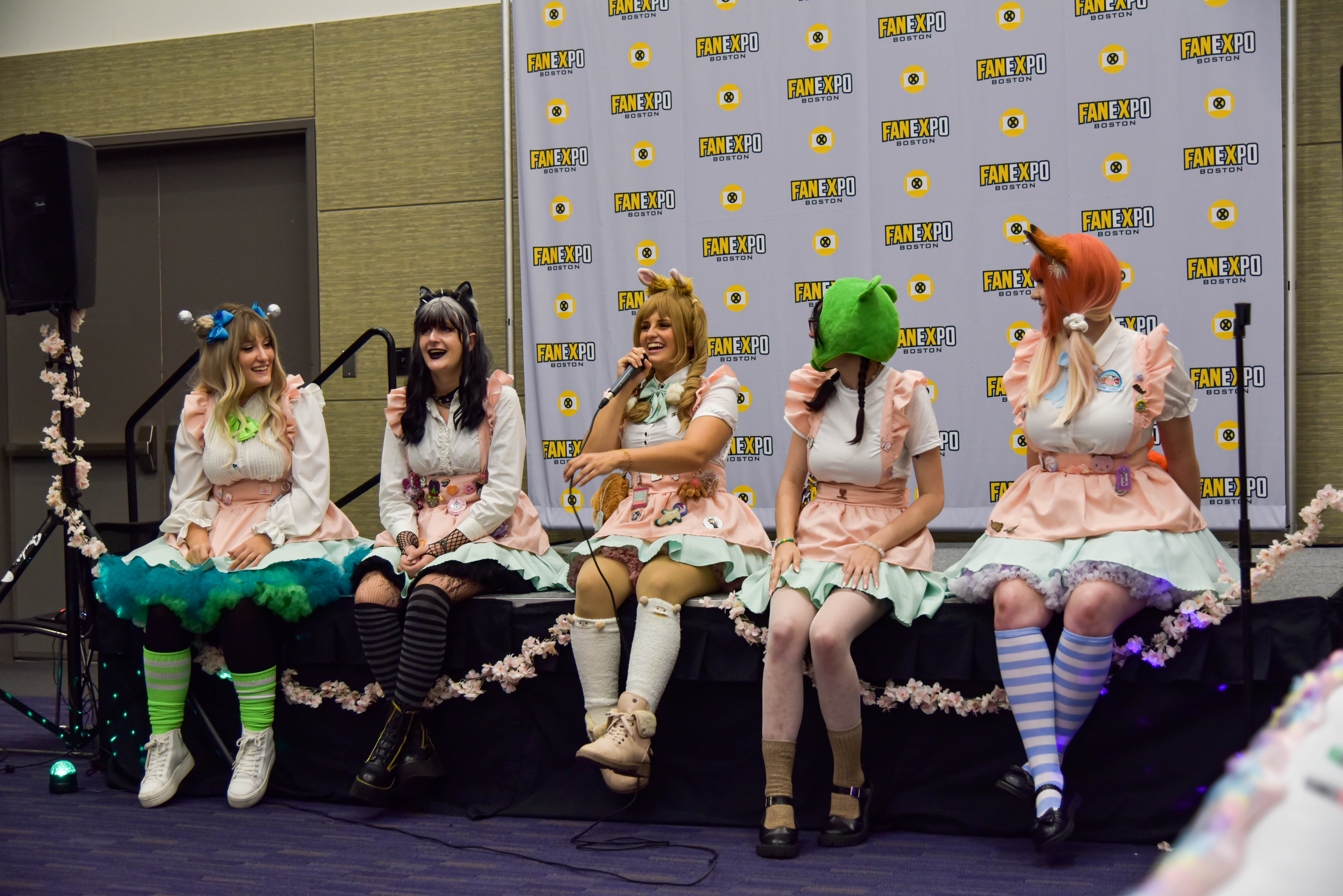The maids at the Maid Cafe speaking to the attendees at the start of a session.